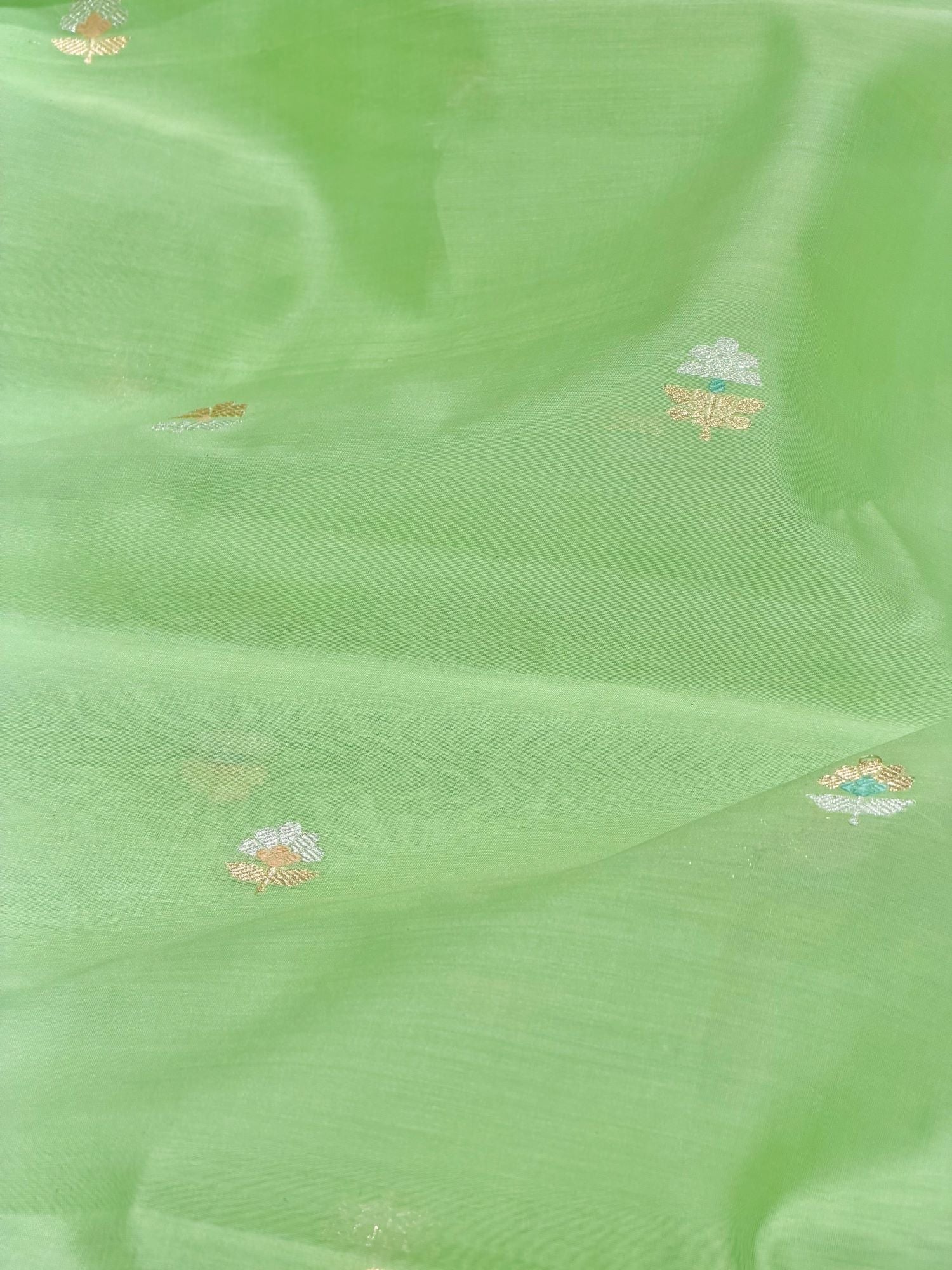 Leaf Green Premium Cotton Fabric With Floral Motif