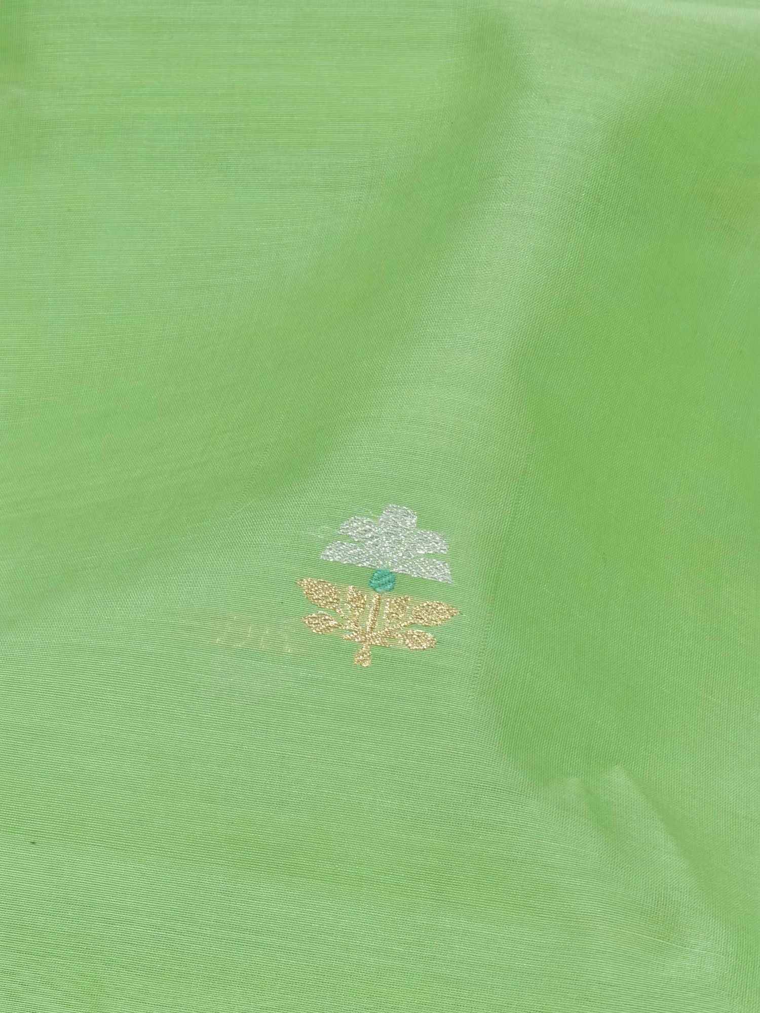 Leaf Green Premium Cotton Fabric With Floral Motif