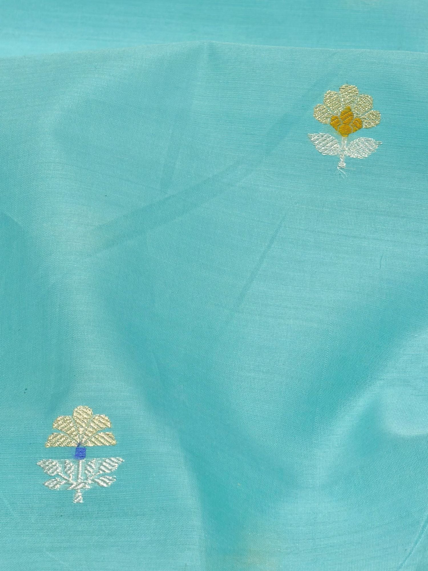 Aqua Blue Premium Cotton Fabric With Floral Motif