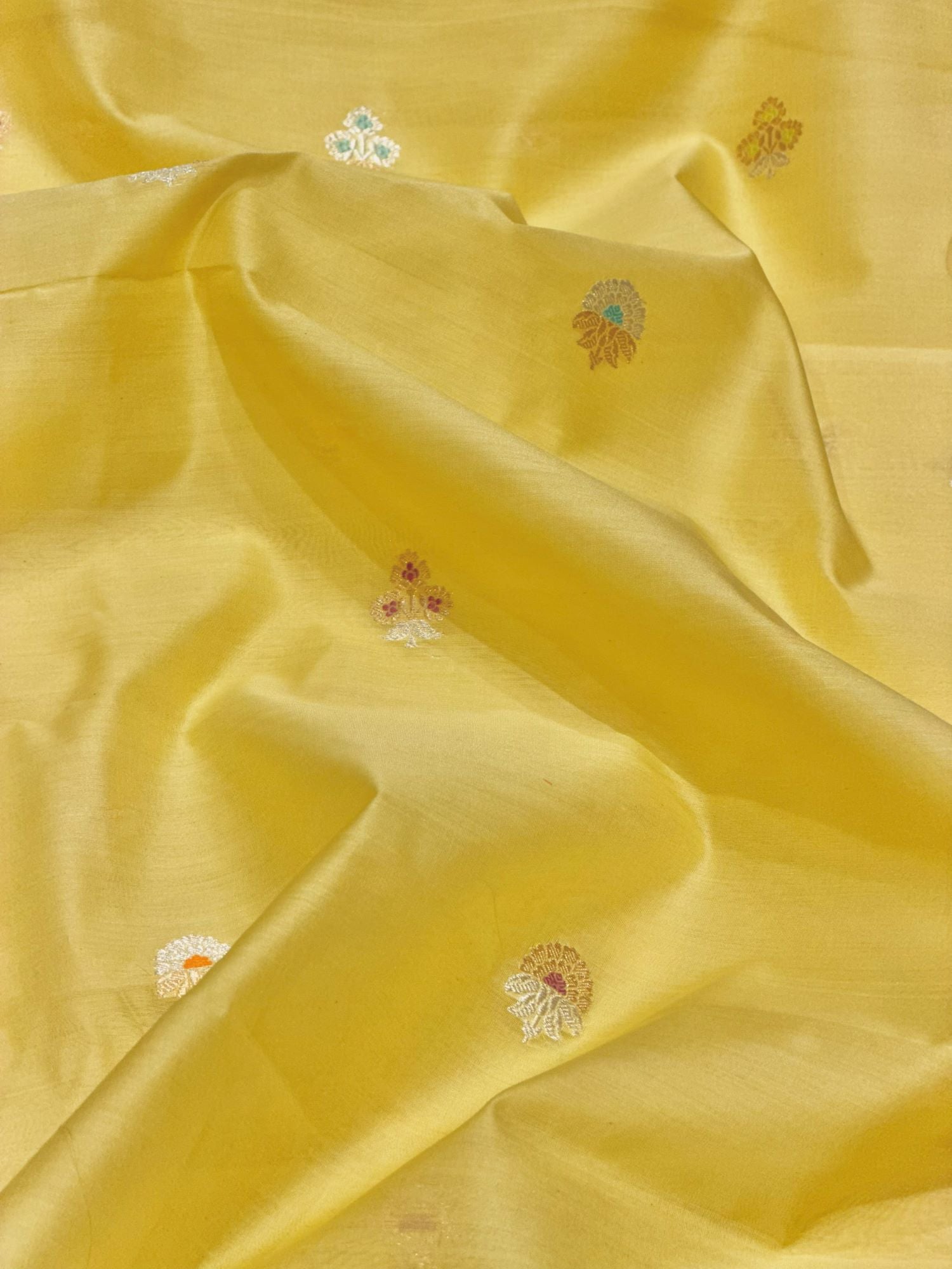 Bright Yellow Premium Cotton Fabric With Floral Motif