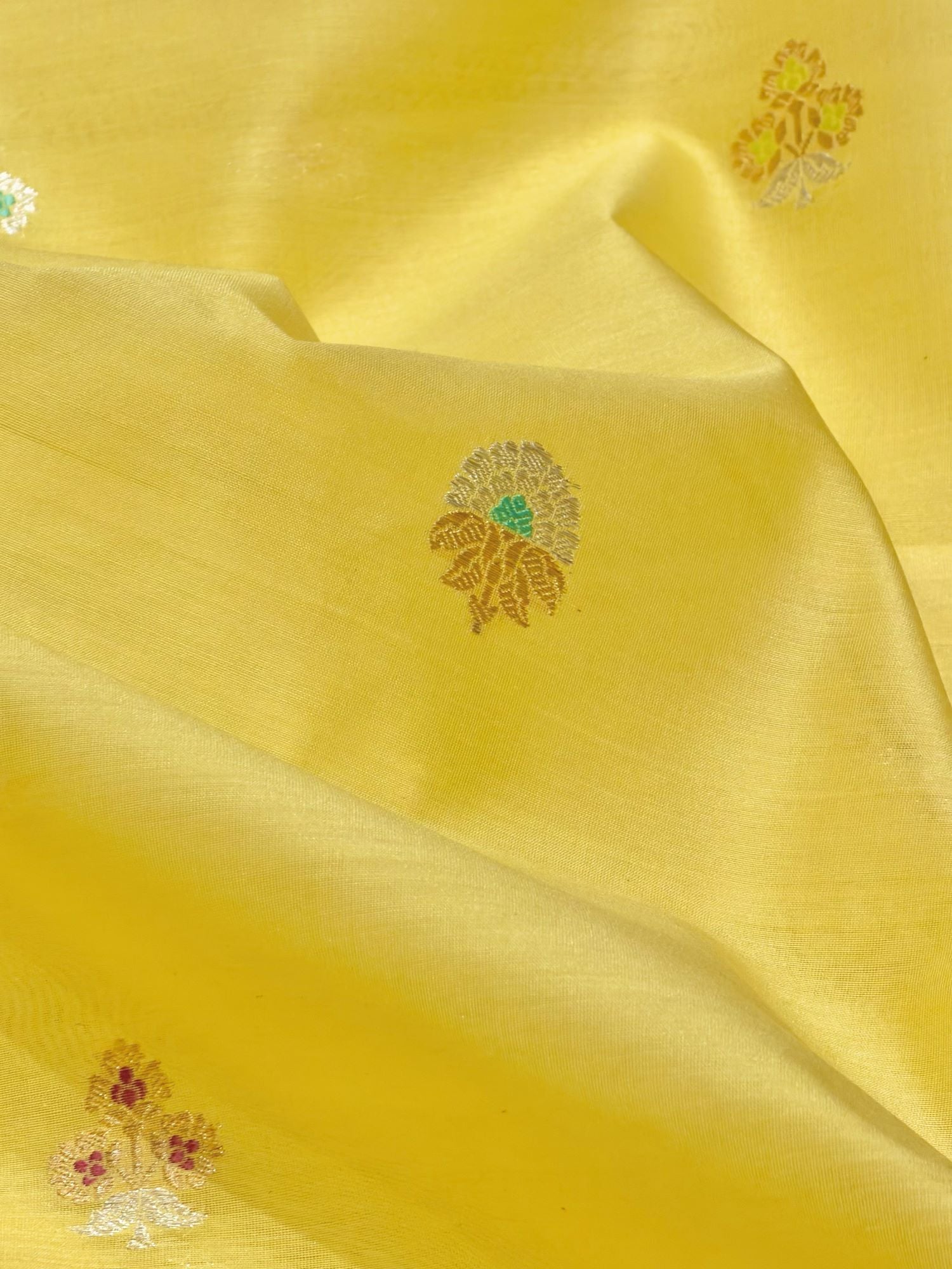 Bright Yellow Premium Cotton Fabric With Floral Motif