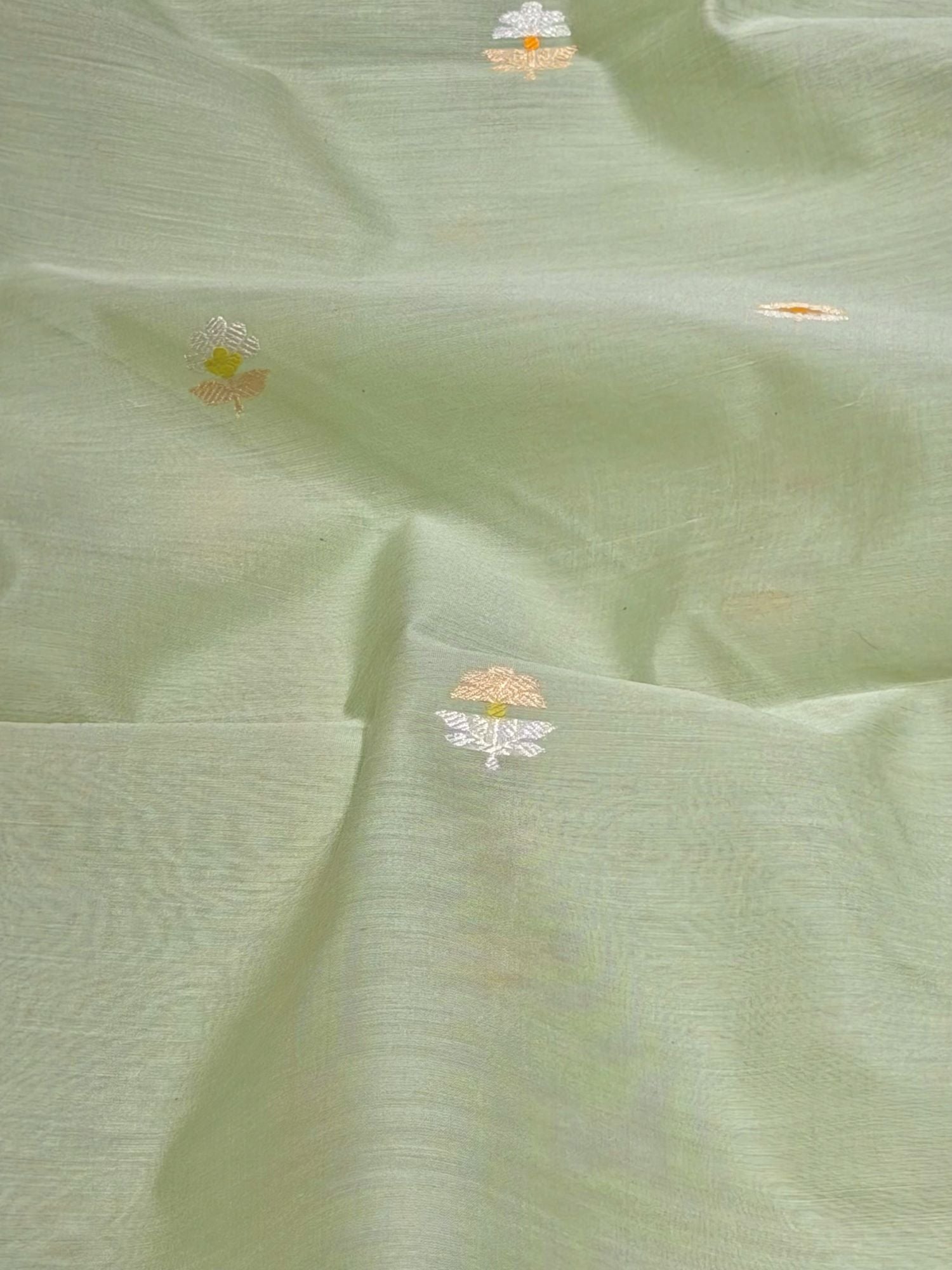 Pista Green Premium Cotton Fabric With Floral Motif