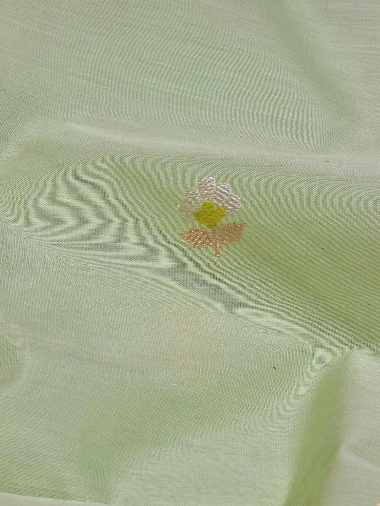 Pista Green Premium Cotton Fabric With Floral Motif