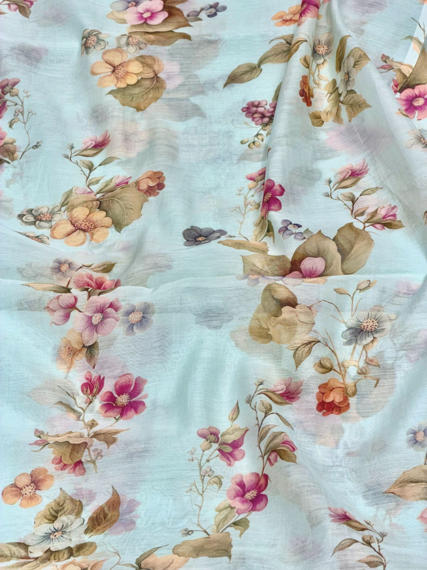 Pastel Blue Mul Floral Prints Fabric