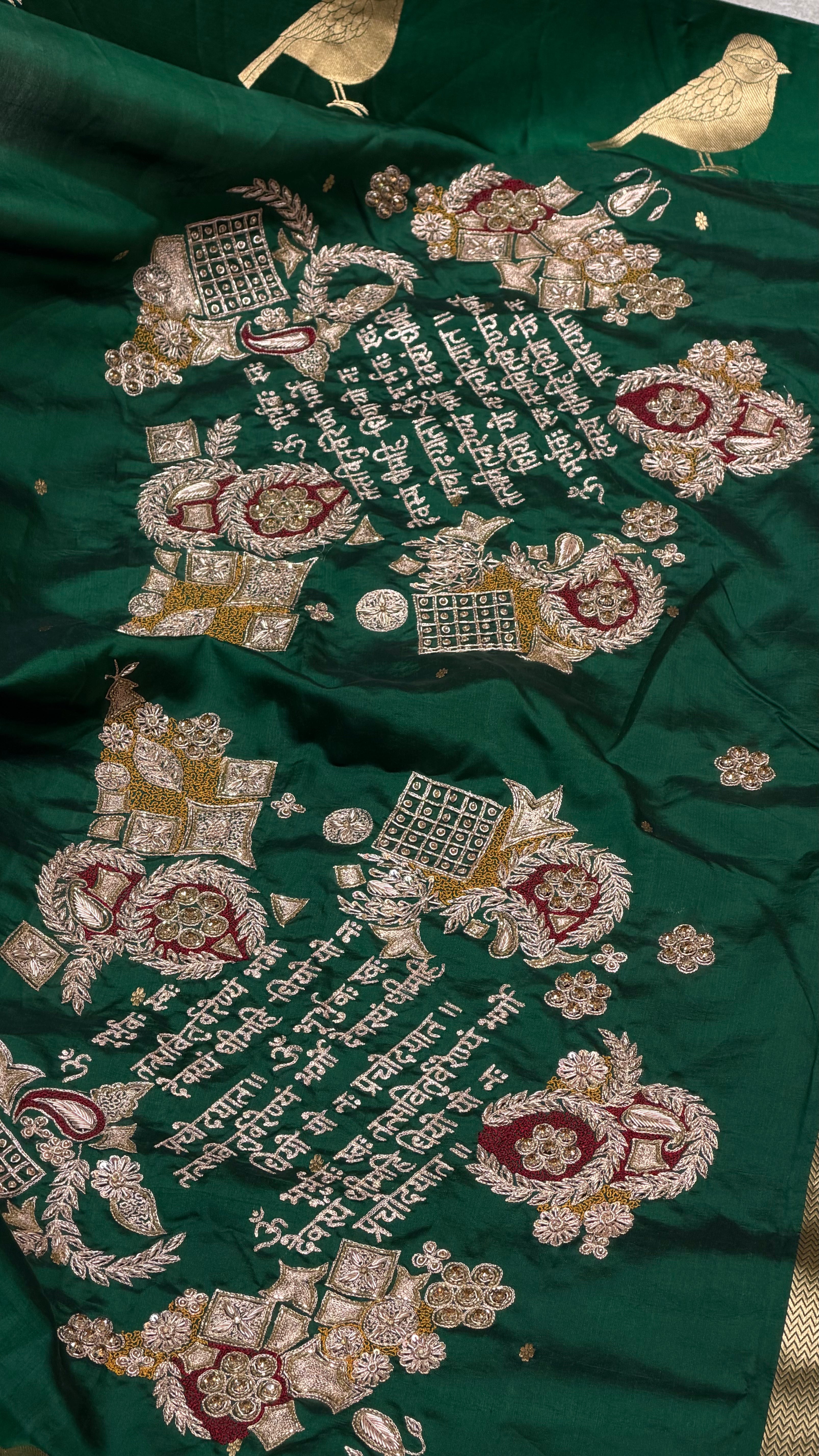 Gayatri Mantra Embellished Handwoven Emerald Green Banarasi Soft Silk Saree With Bird Motifs