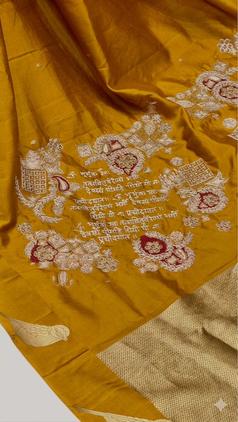 Gayatri Mantra Embellished Handwoven Golden Yellow Banarasi Soft Silk Saree With Bird Motifs