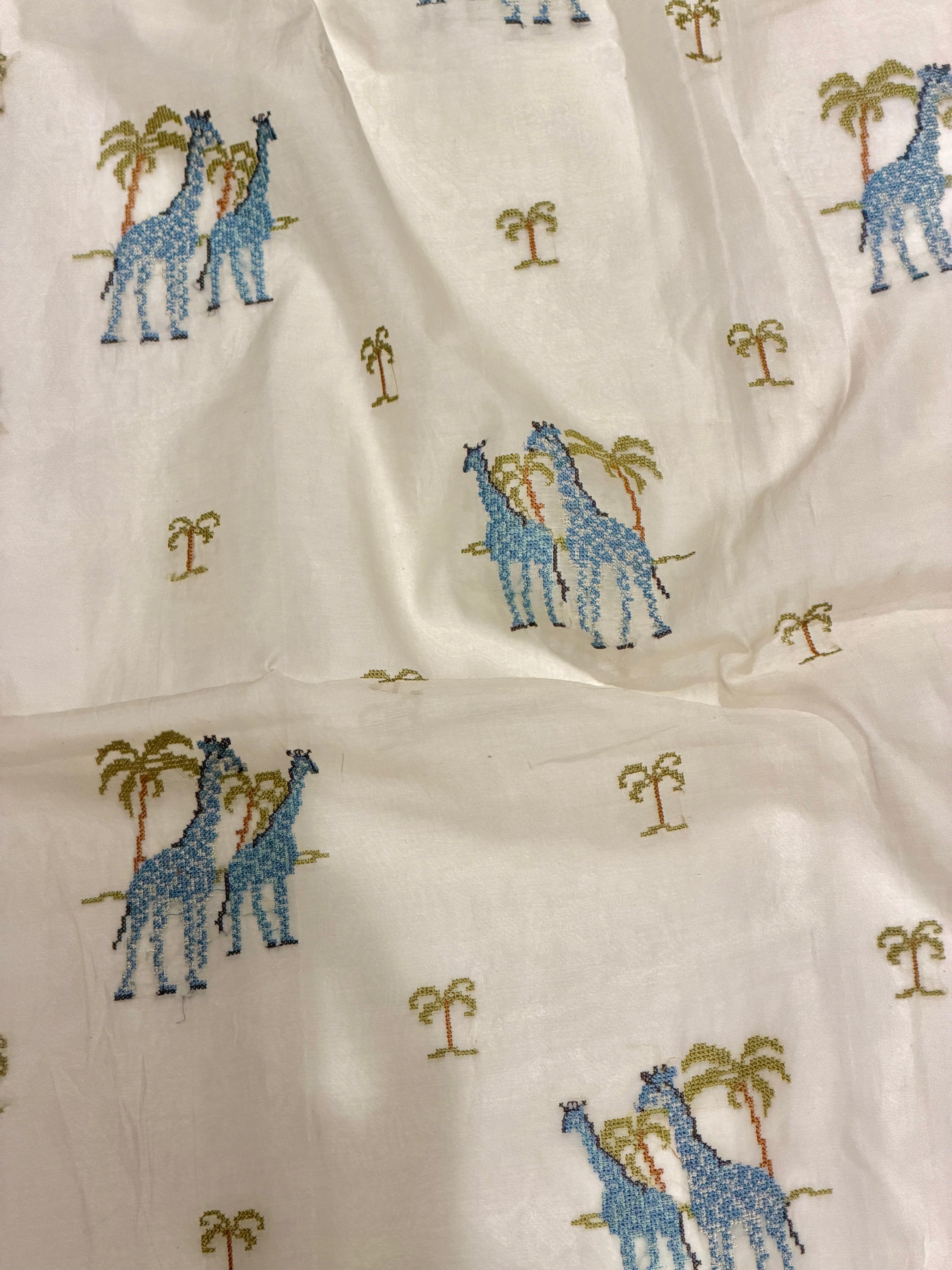 White Mul Fabric with Embroidered Pattern