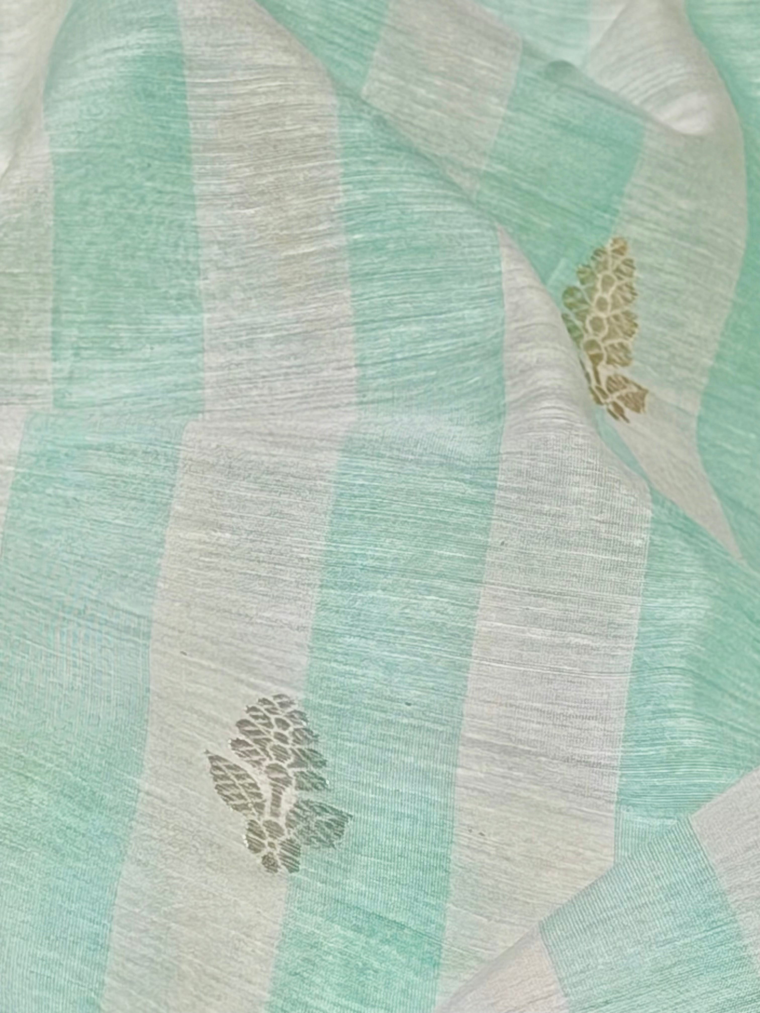 Aqua Green Premium Cotton Fabric With Floral Motifs
