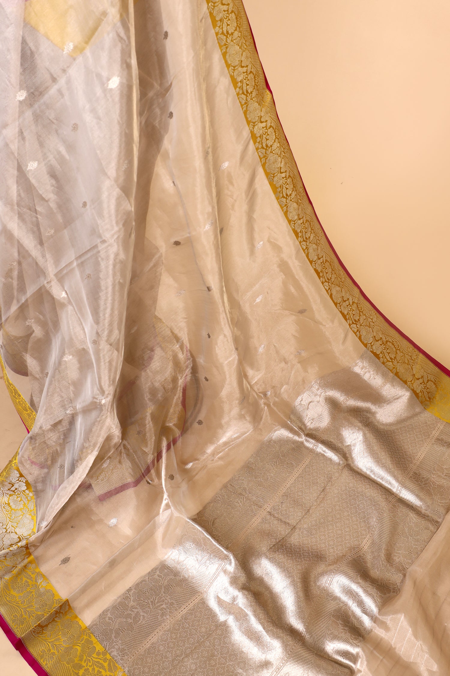 Champagne Tissue Silk Saree With Yellow Contrast Border