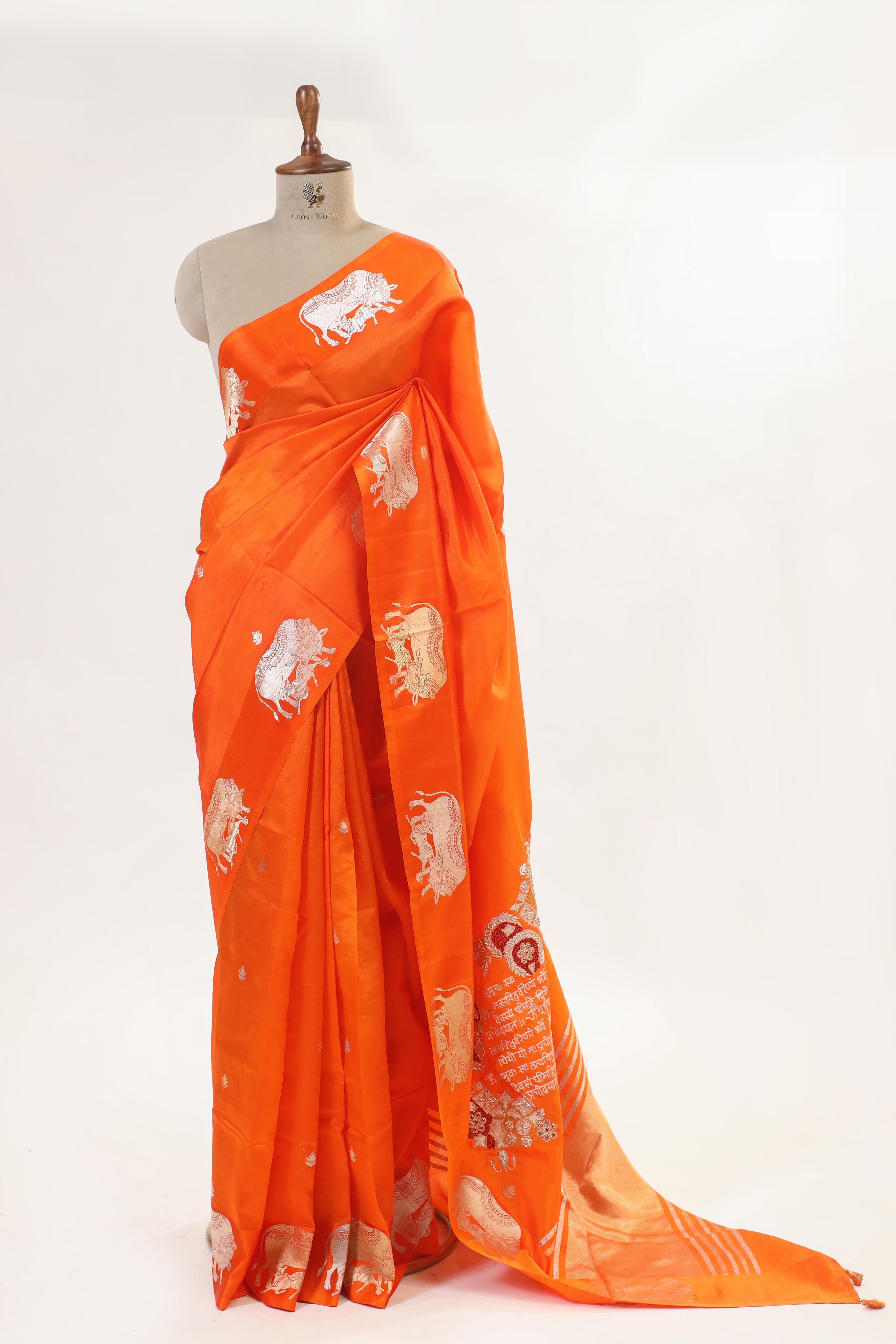 Gayatri Mantra Embellished Handwoven Orange Banarasi Soft Silk Saree WIth Nandi Motifs