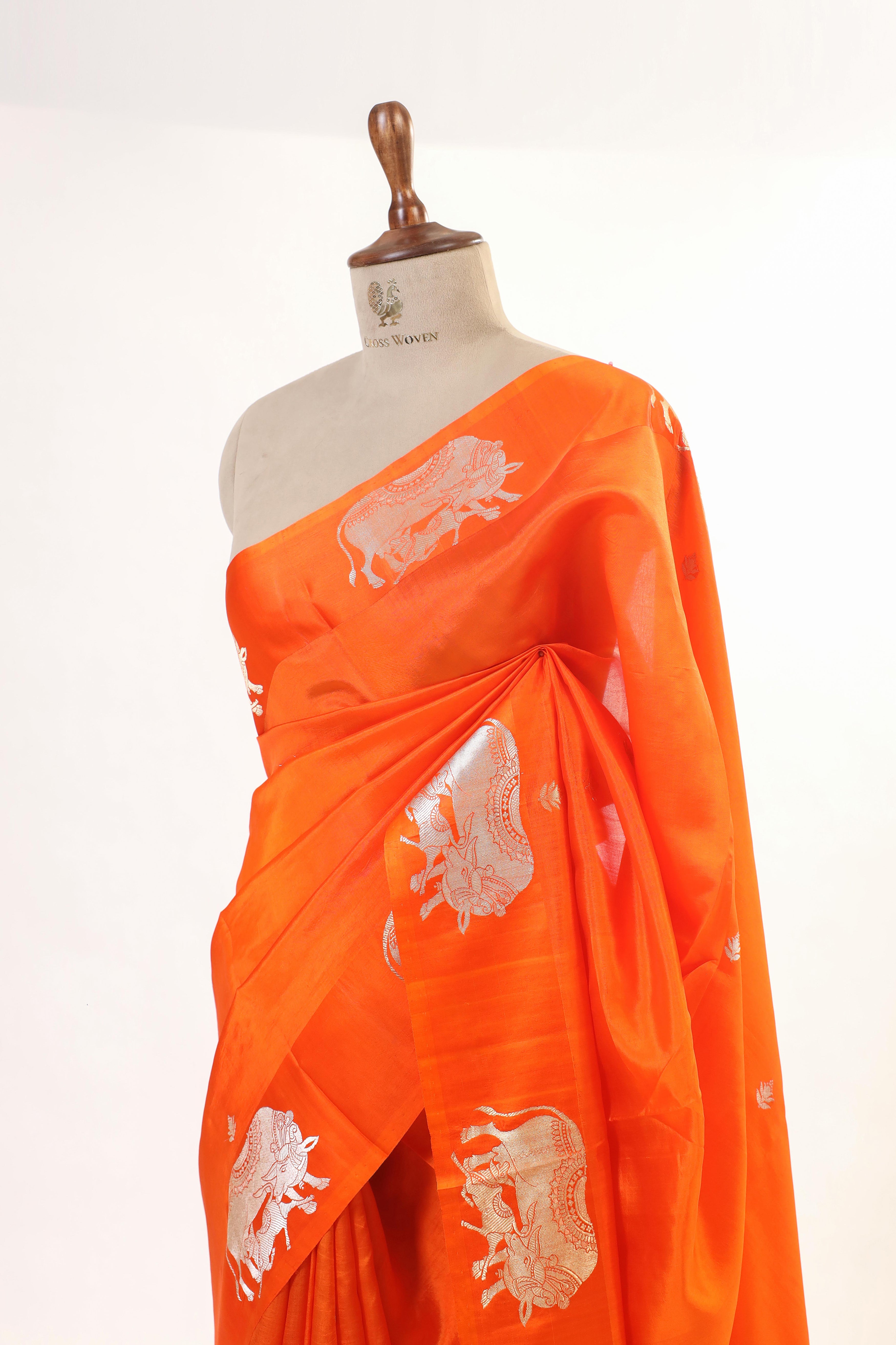 Gayatri Mantra Embellished Handwoven Orange Banarasi Soft Silk Saree WIth Nandi Motifs