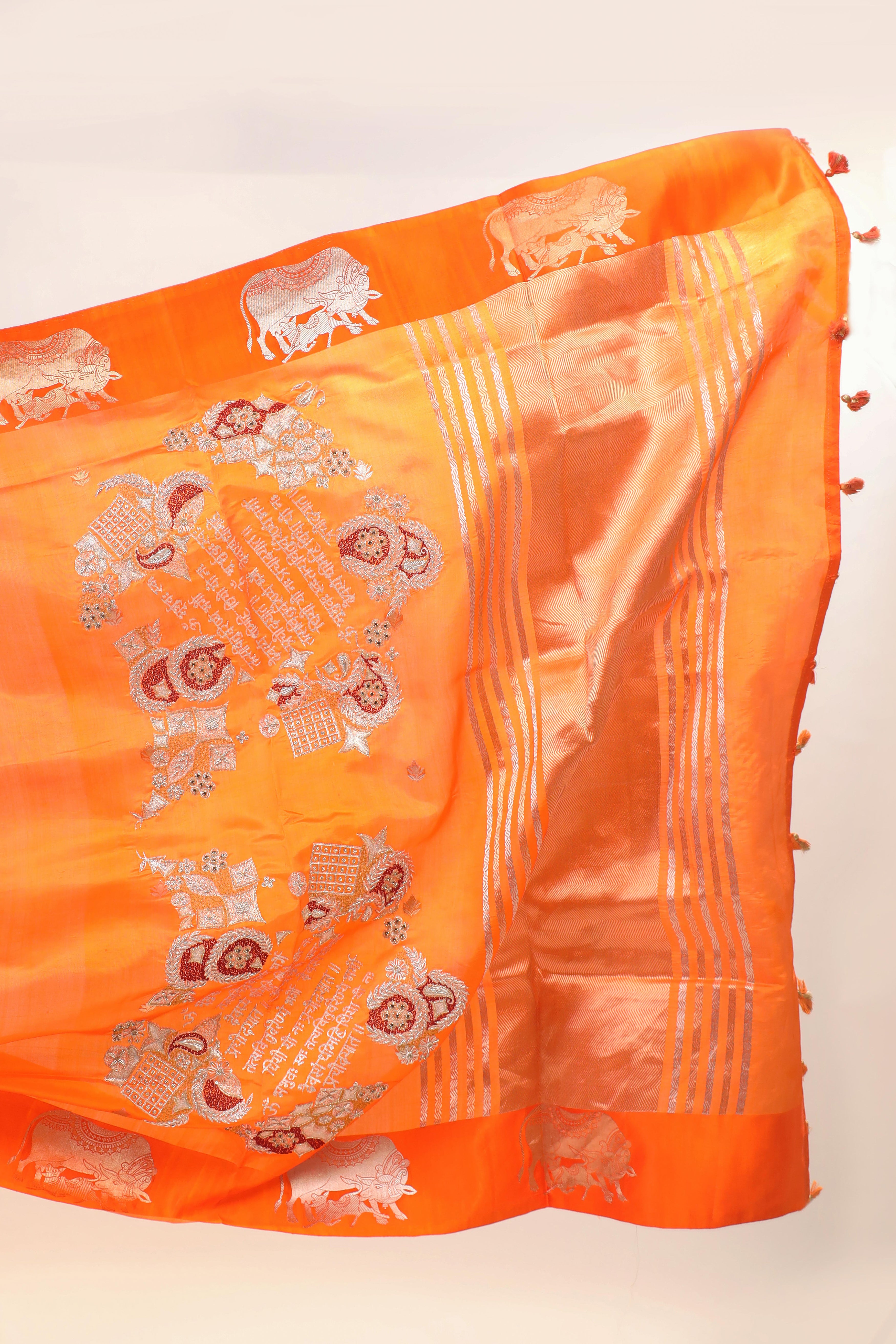 Gayatri Mantra Embellished Handwoven Orange Banarasi Soft Silk Saree WIth Nandi Motifs