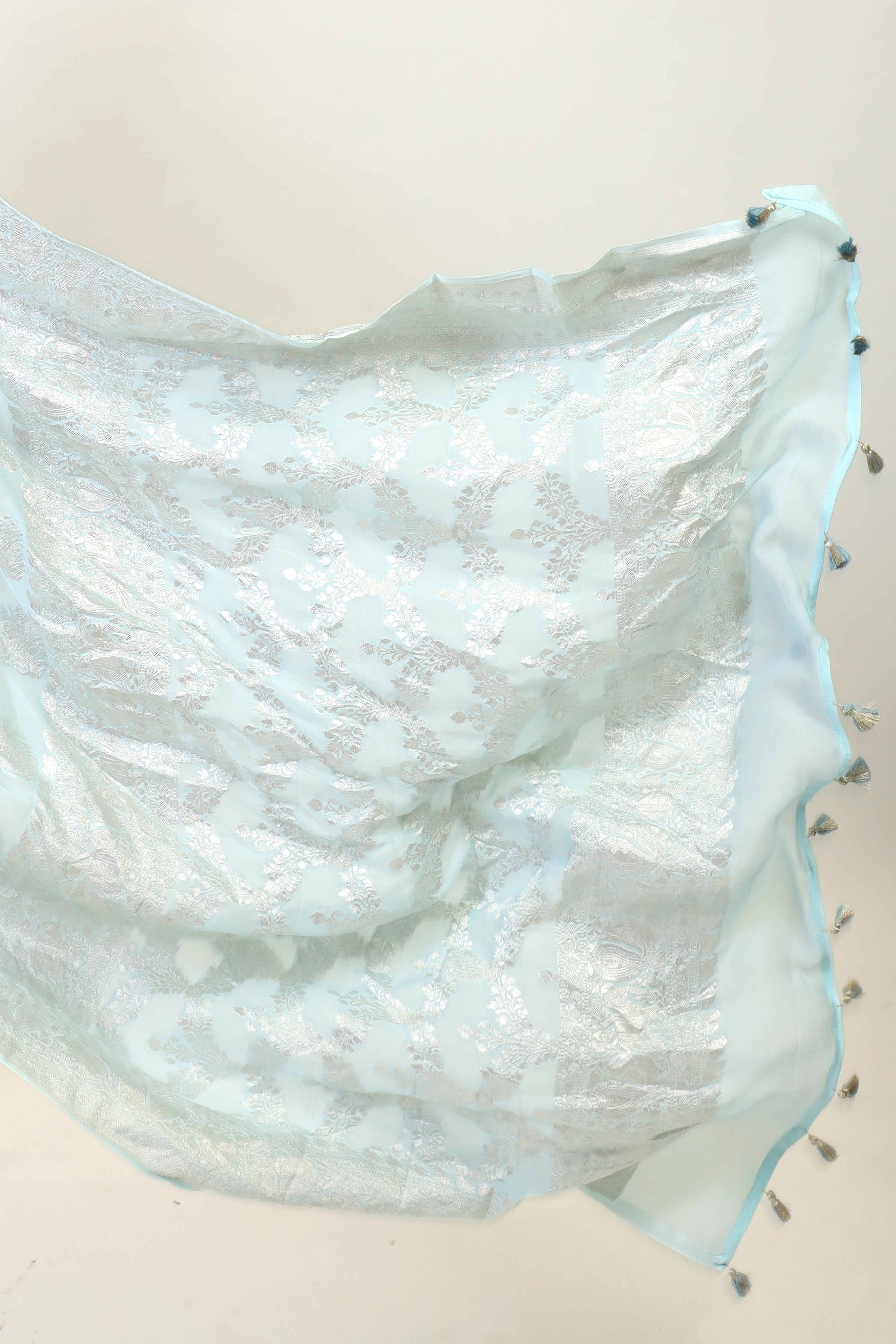 Sky Blue Banarasi Georgette Khaddi Floral Motif With Silver Zari Saree