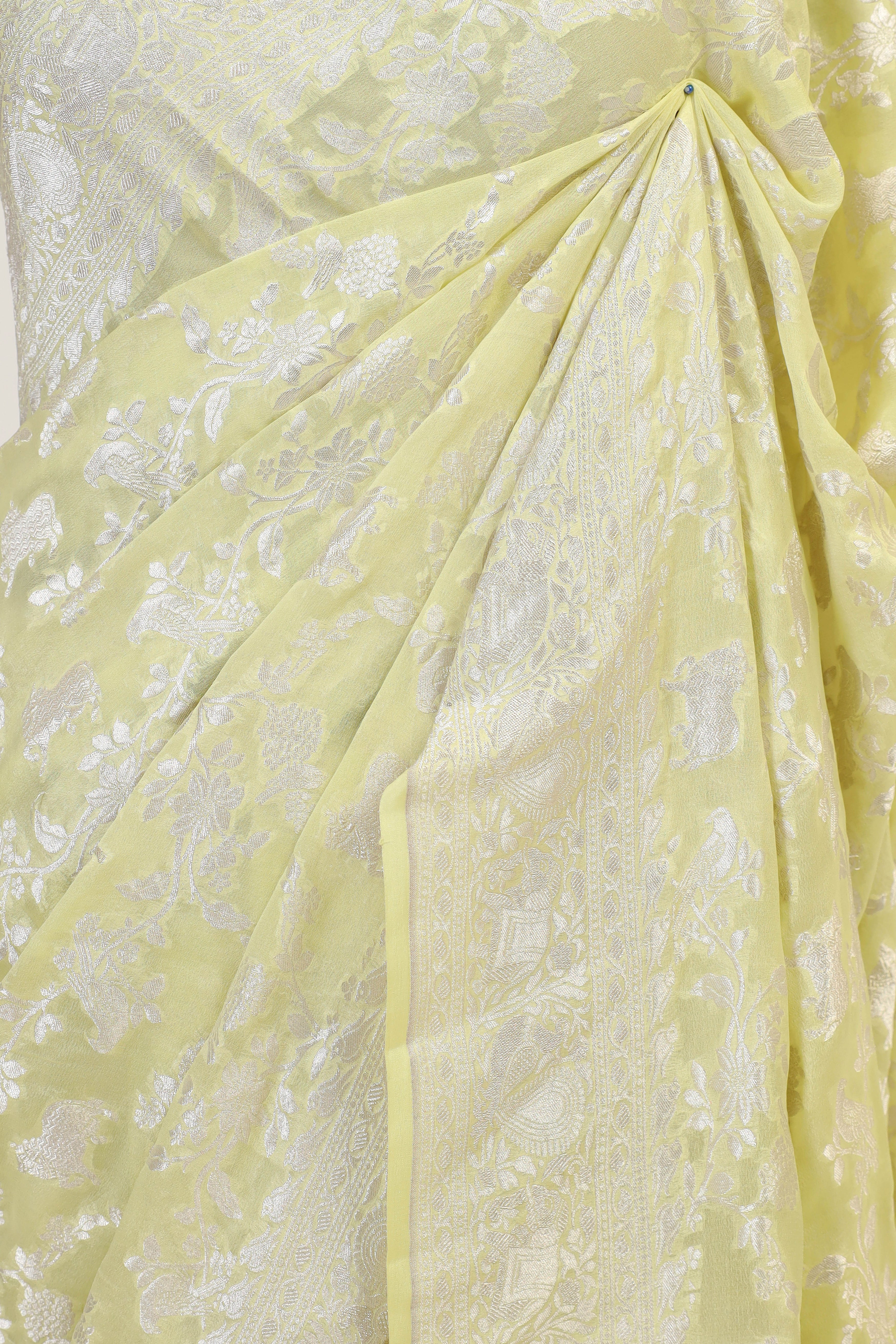 Lemon Yellow Banarasi Georgette Khaddi Floral Motif With Silver Zari Silk Saree