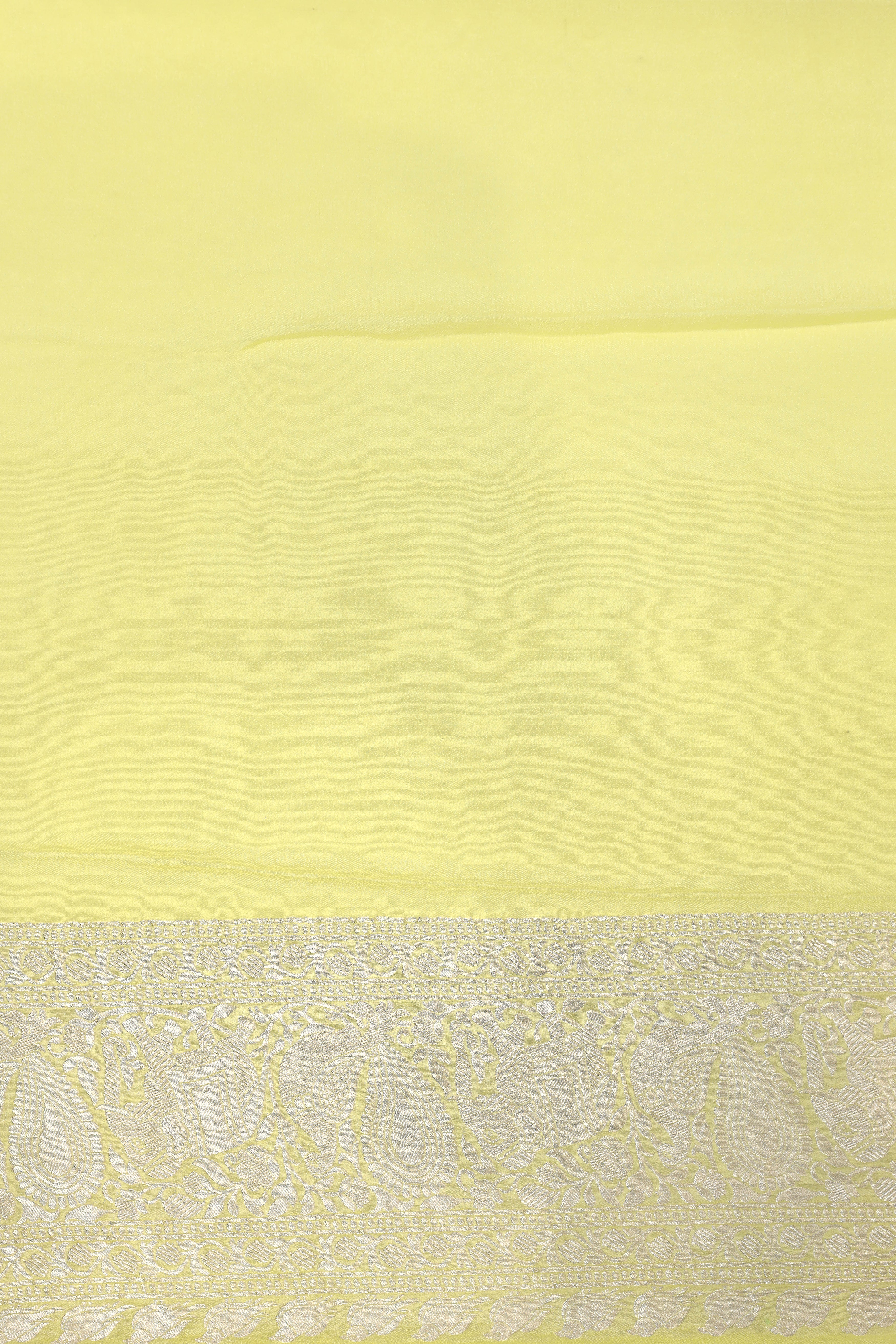 Lemon Yellow Banarasi Georgette Khaddi Floral Motif With Silver Zari Silk Saree