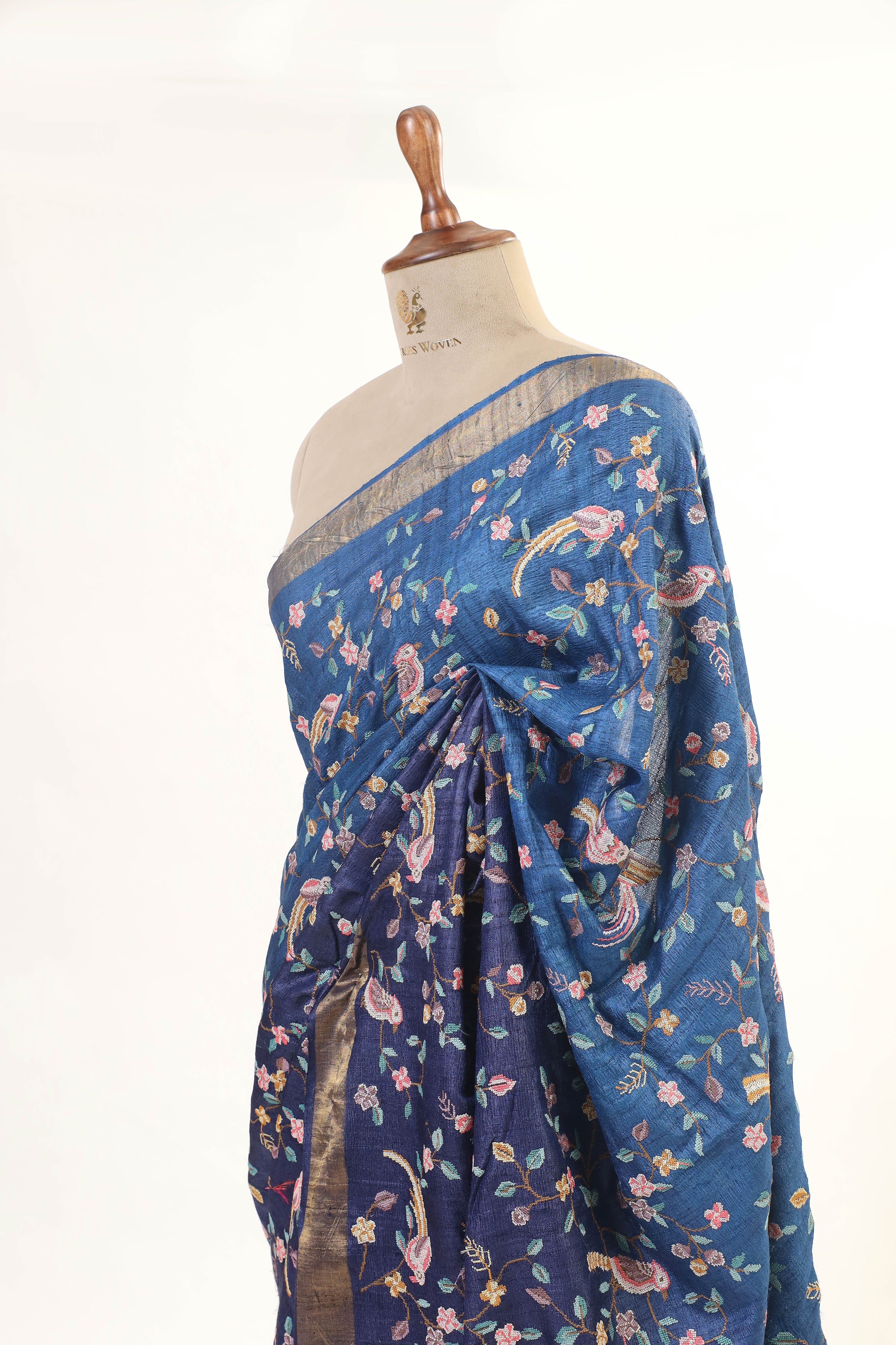 Royal Blue Tussar Silk Saree with Intricate Floral and Bird Embroidery and Subtle Golden Border