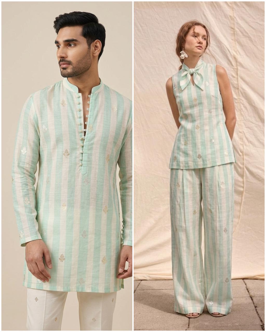 Aqua Green Premium Cotton Fabric With Floral Motifs