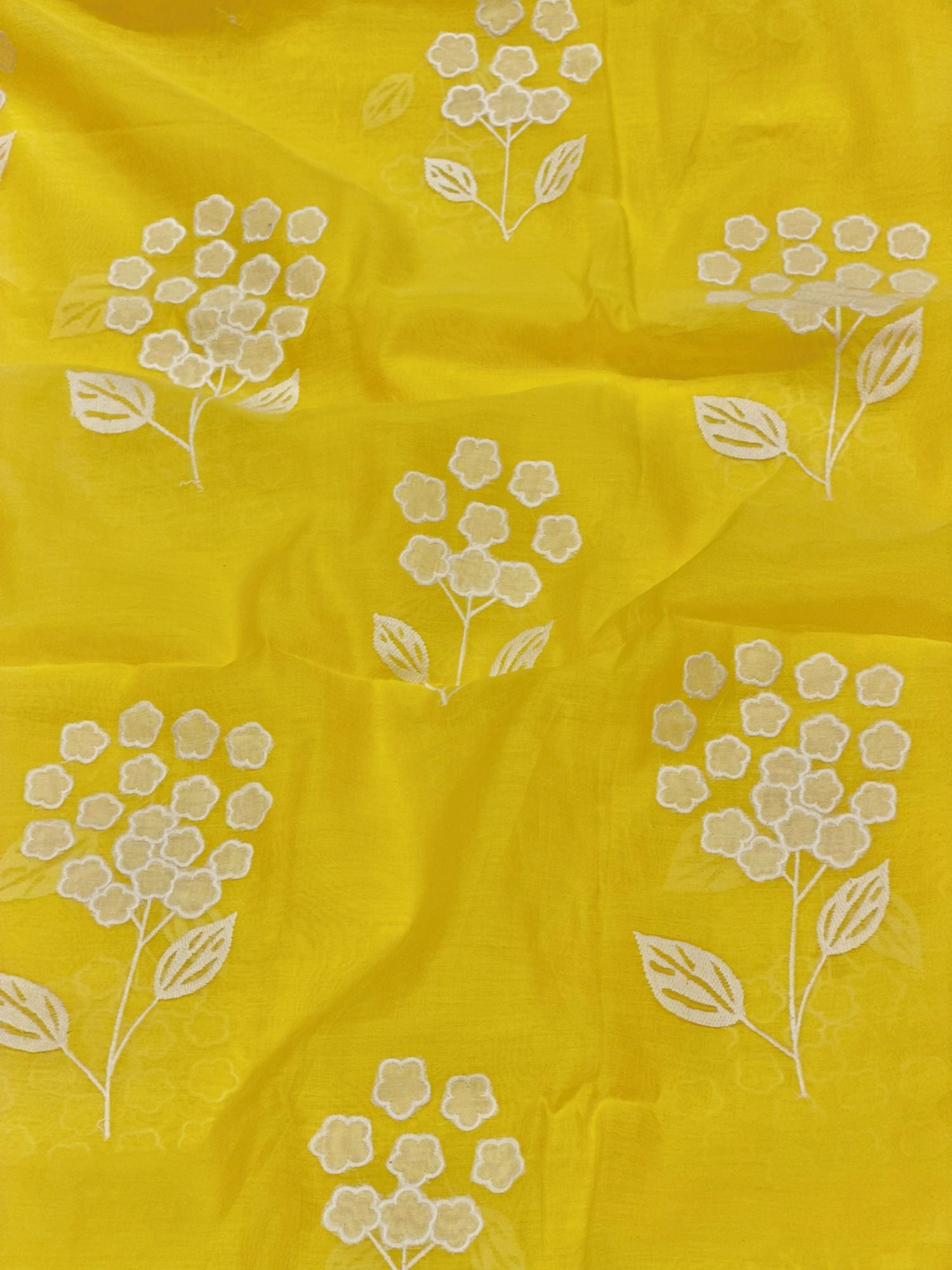 Yellow Mul Fabric With White Appliqué Work