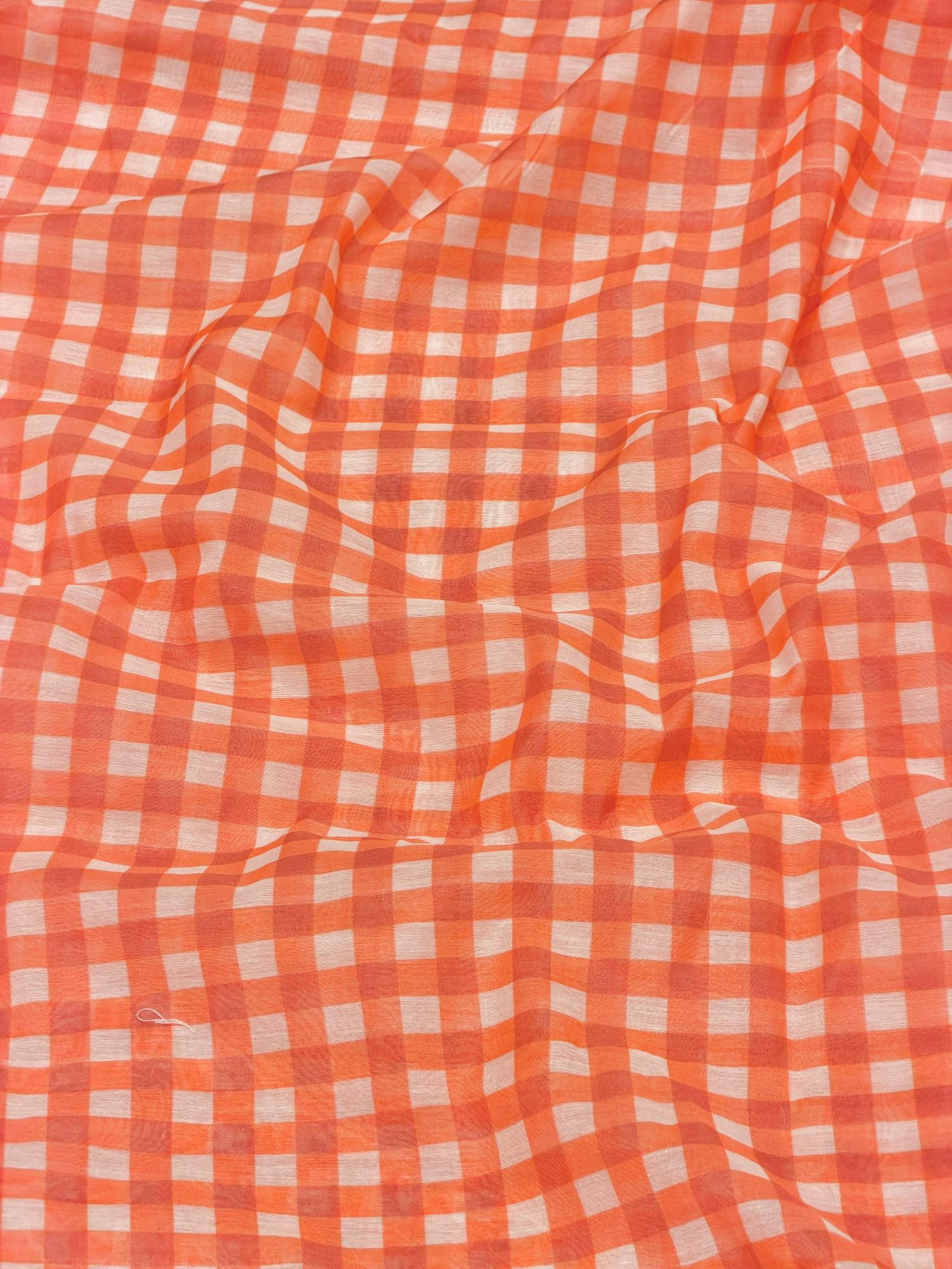 Orange Printed Mul Checkered Fabric