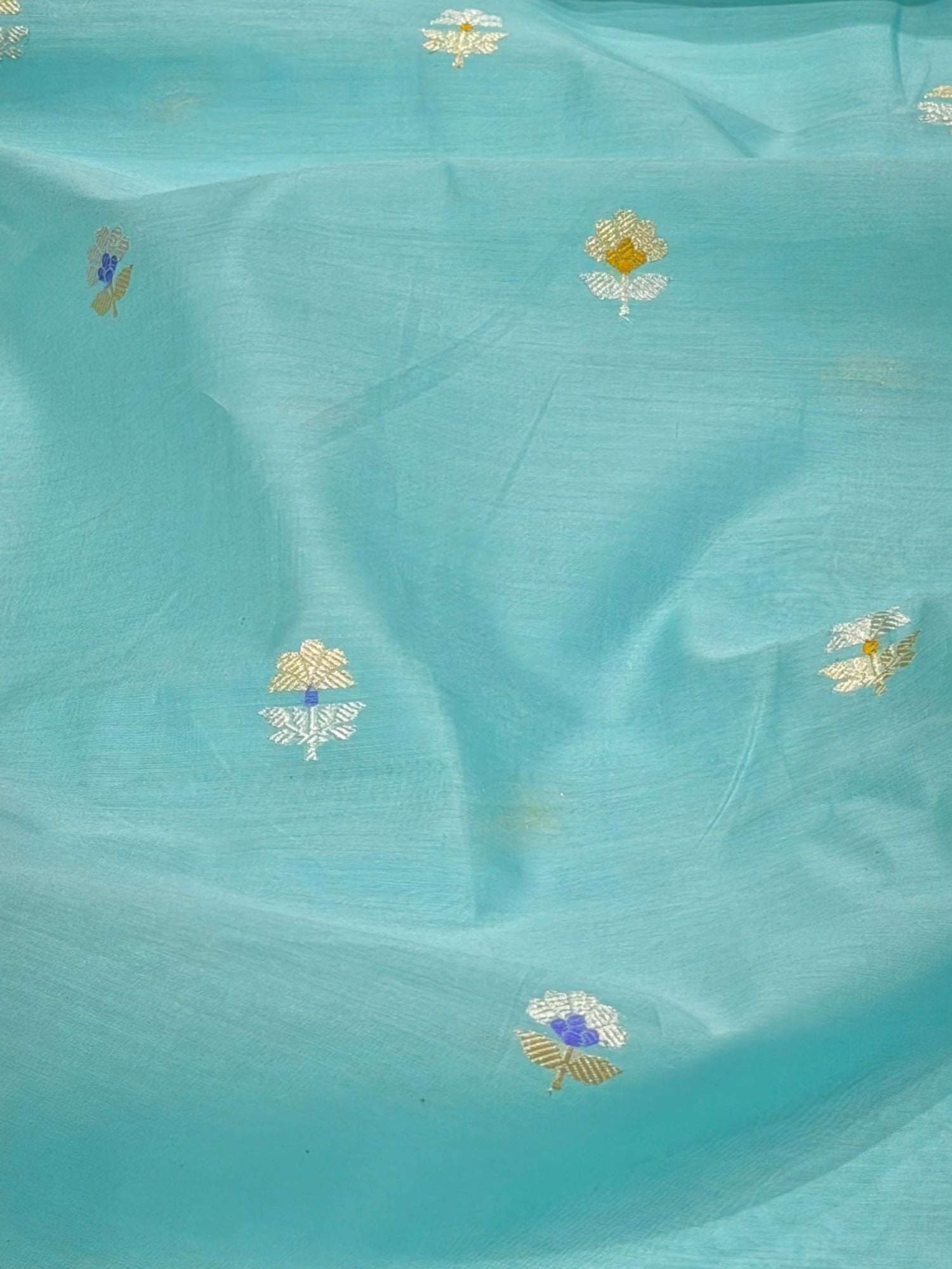 Aqua Blue Premium Cotton Fabric With Floral Motif