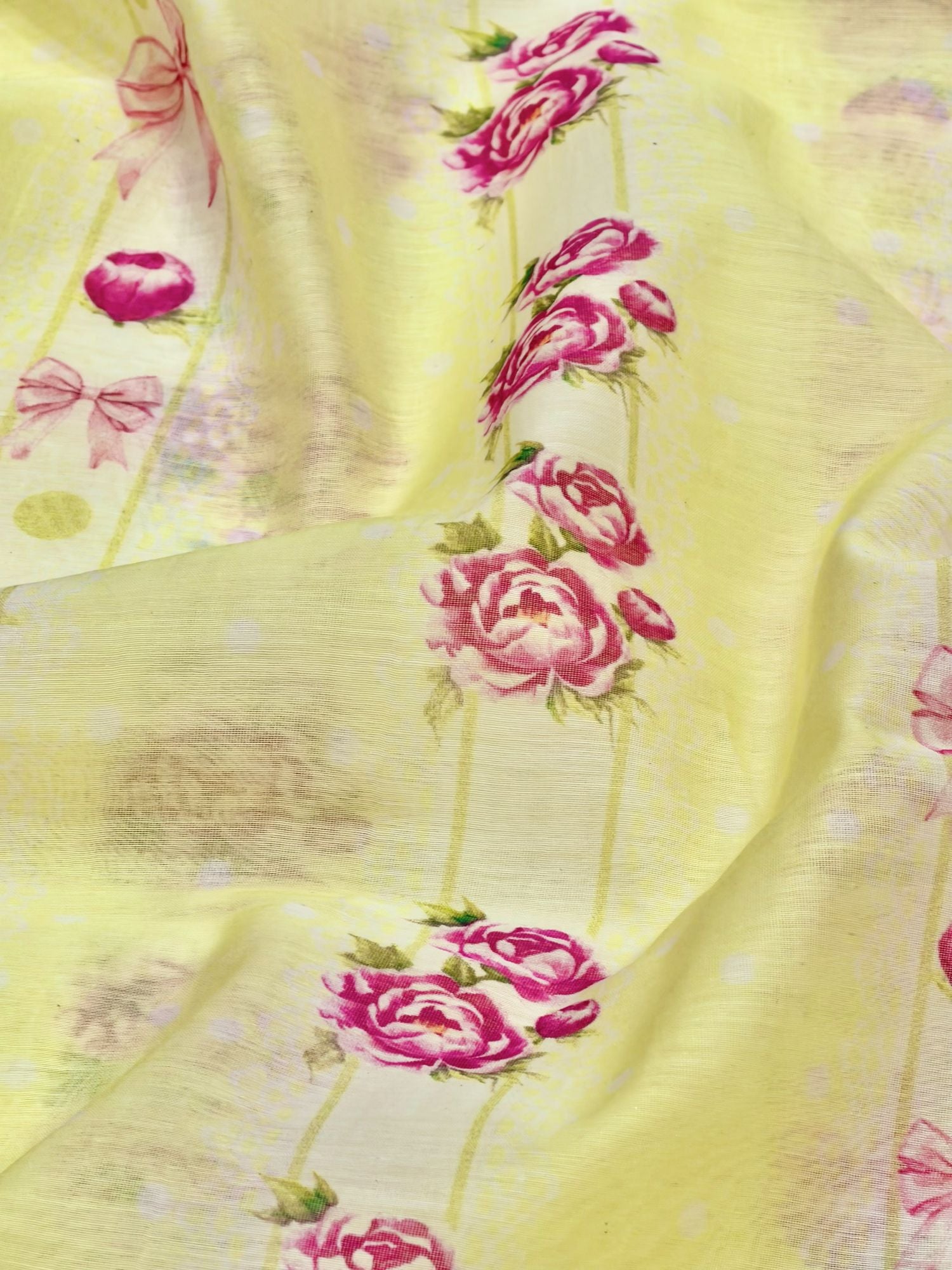 Pastel Yellow Mul Floral Prints Fabric