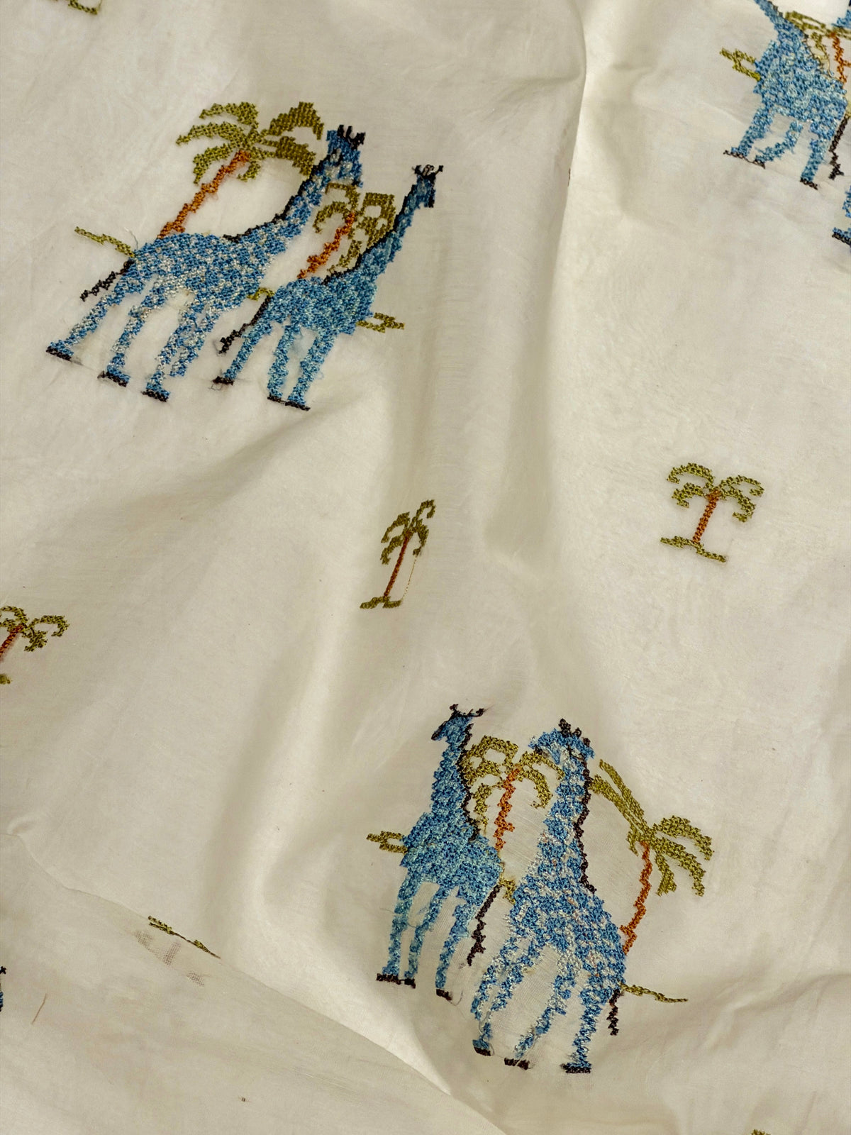 White Mul Fabric with Embroidered Pattern
