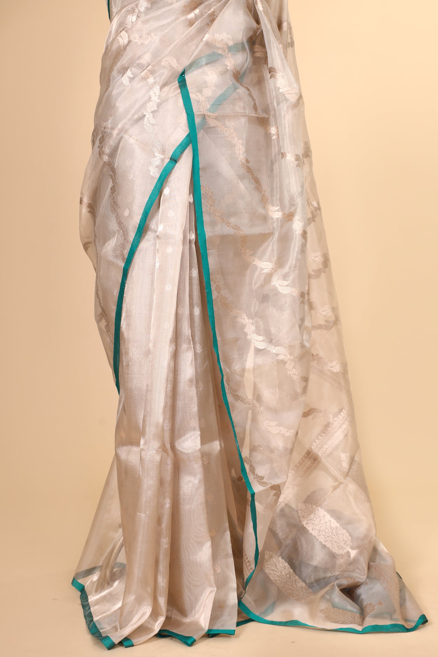 Champagne Tissue Silk Saree With Leheriya Pattern