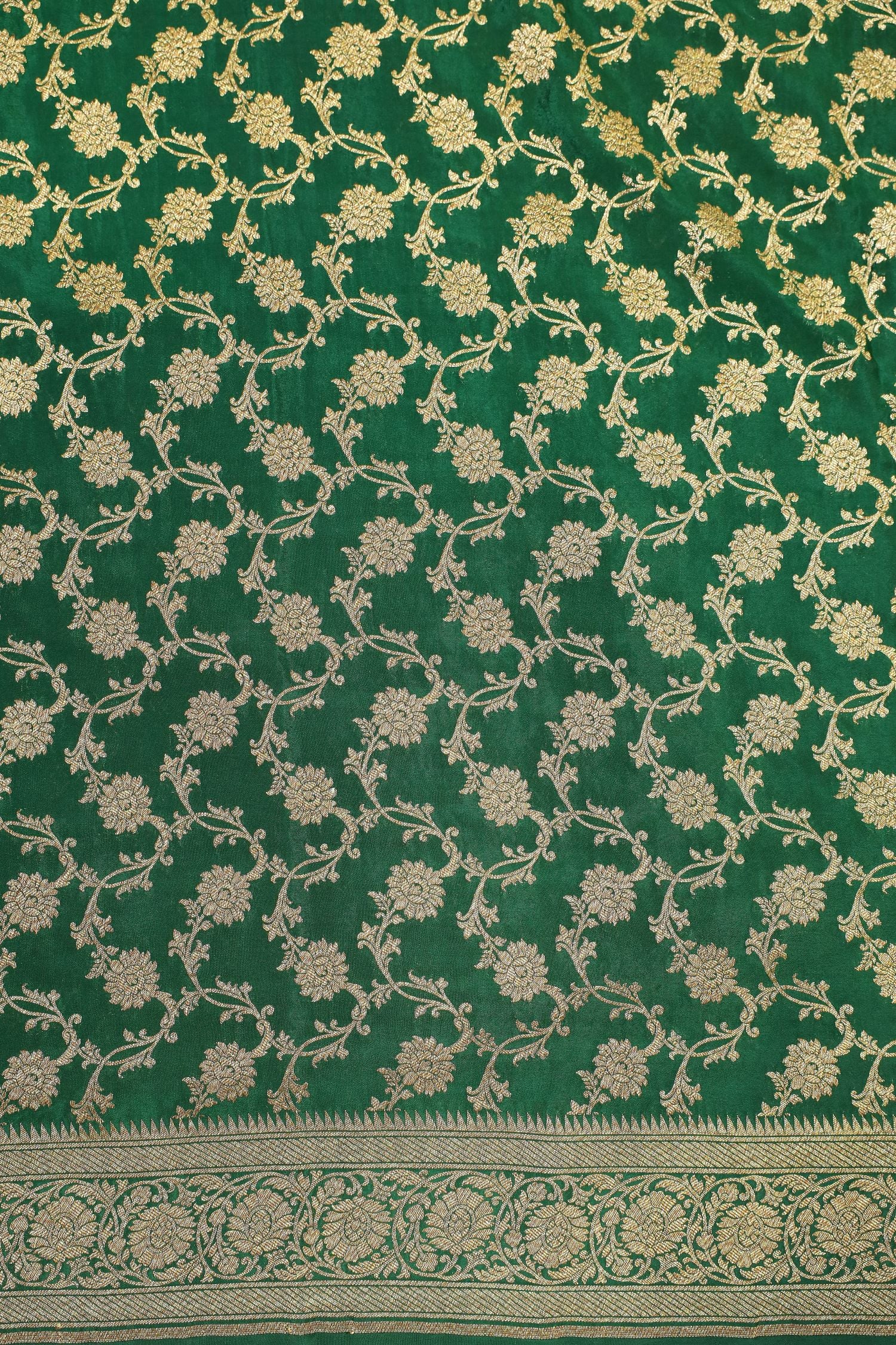 Bottle Green Crepe Silk Saree with Antique Zari Floral Border