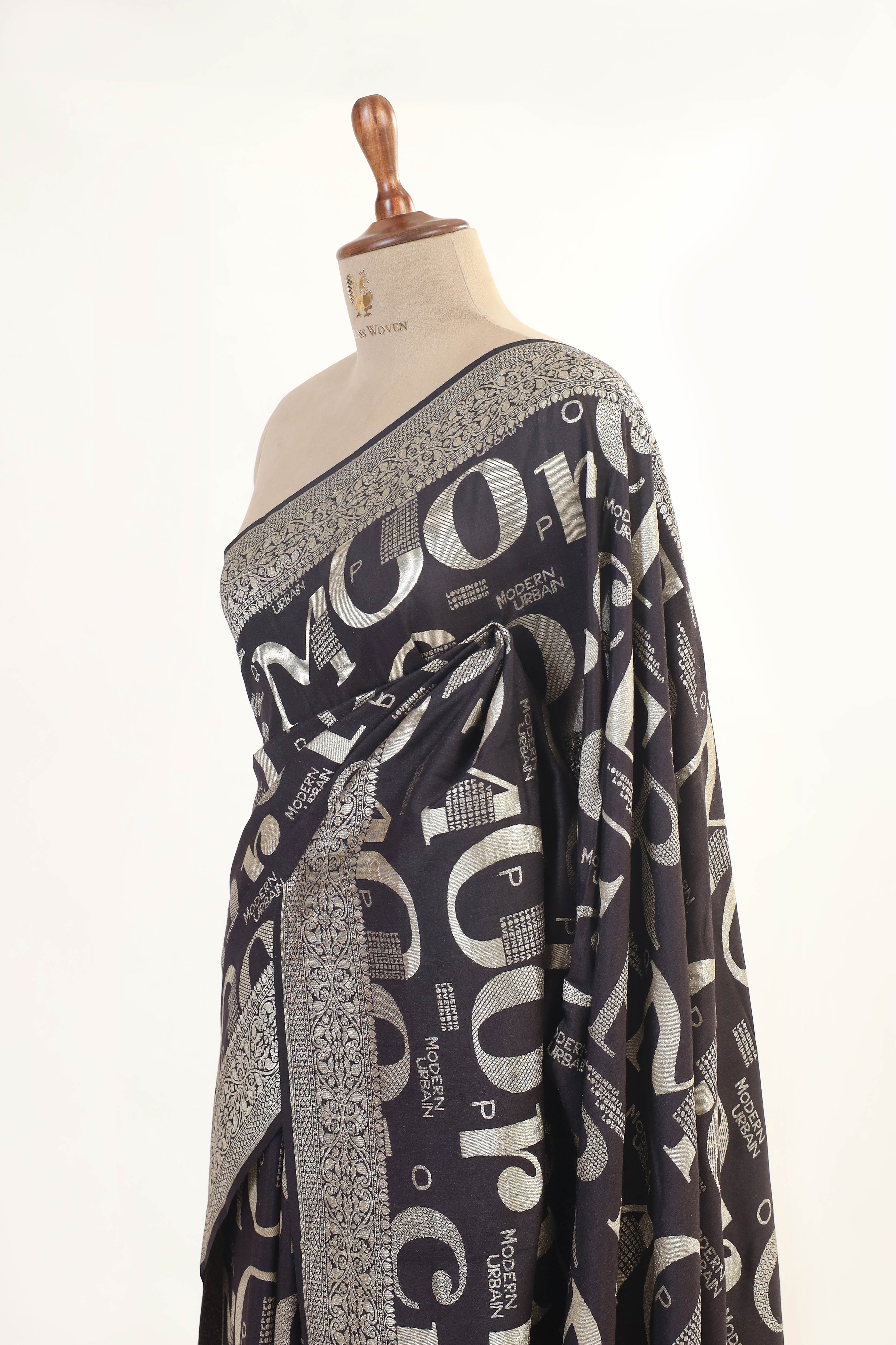 Elegant Moonga Silk Saree with Contemporary Typography Design and Intricate Border