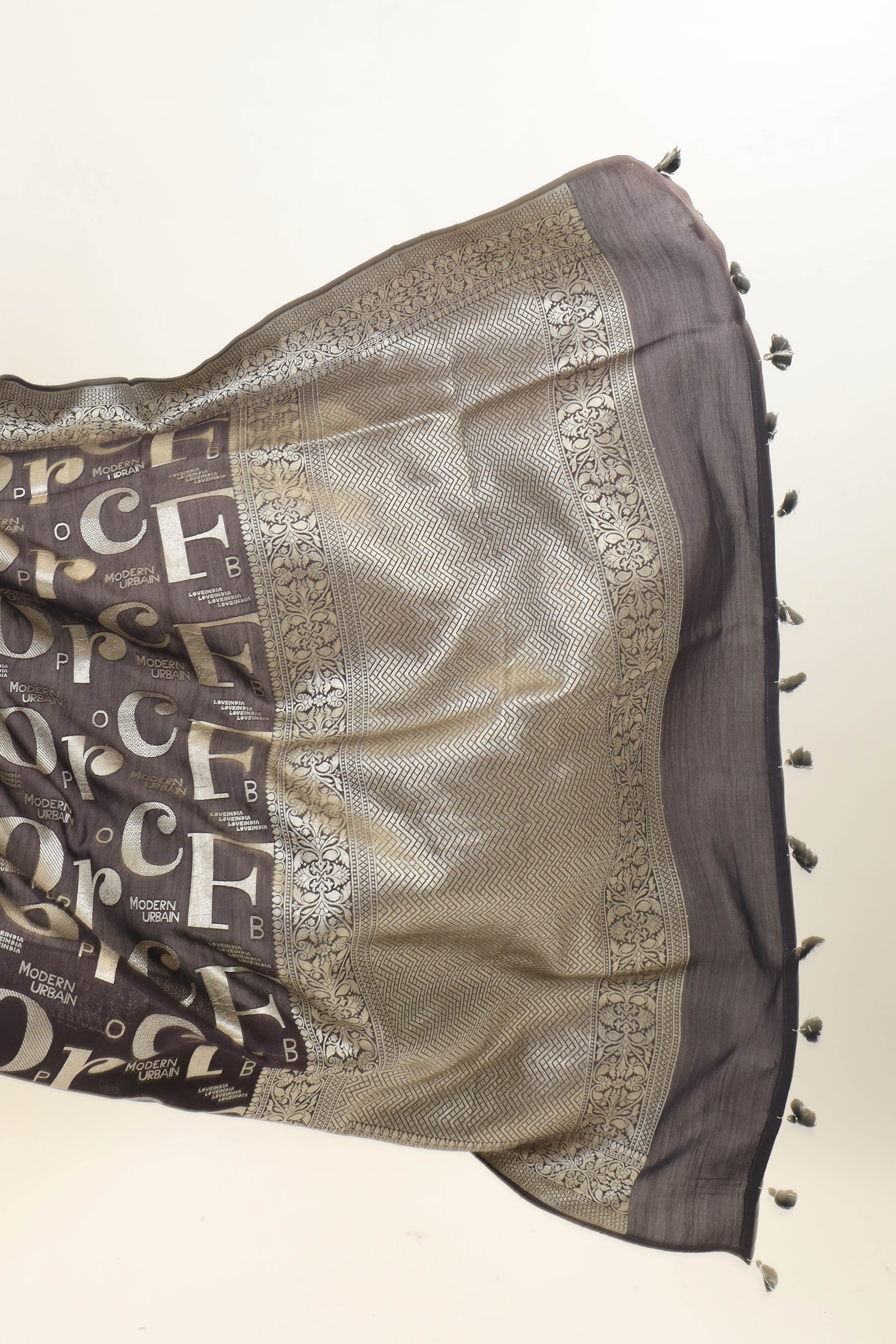 Elegant Moonga Silk Saree with Contemporary Typography Design and Intricate Border