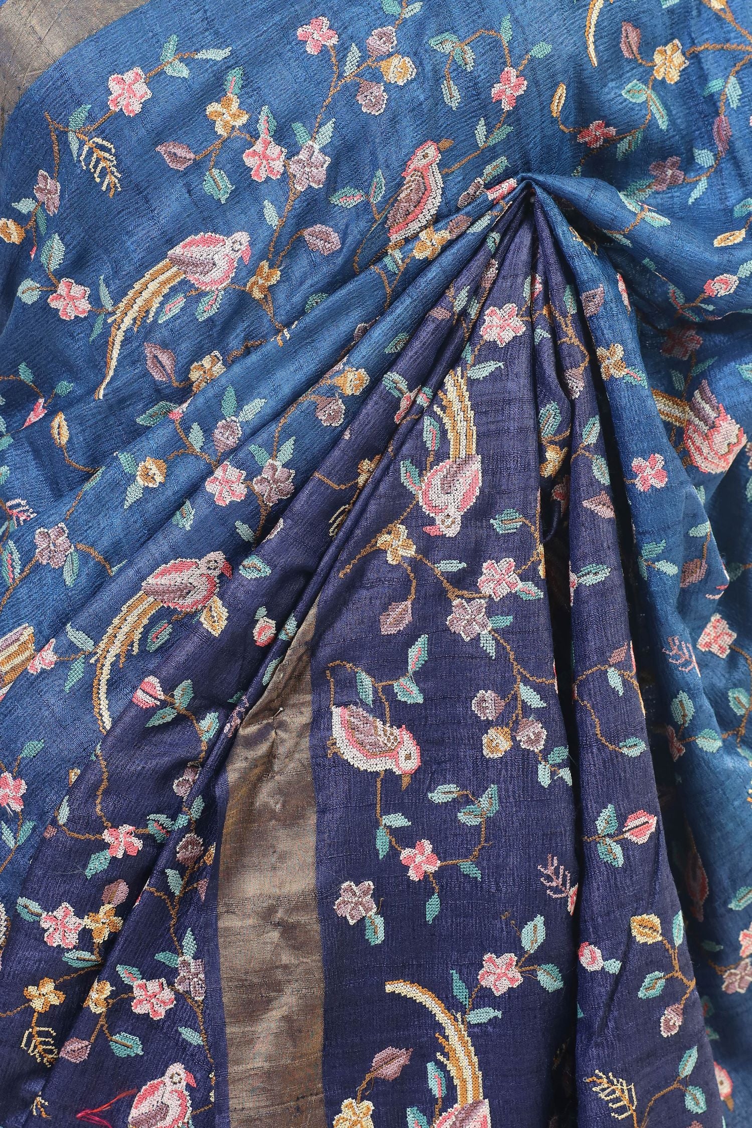 Royal Blue Tussar Silk Saree with Intricate Floral and Bird Embroidery and Subtle Golden Border