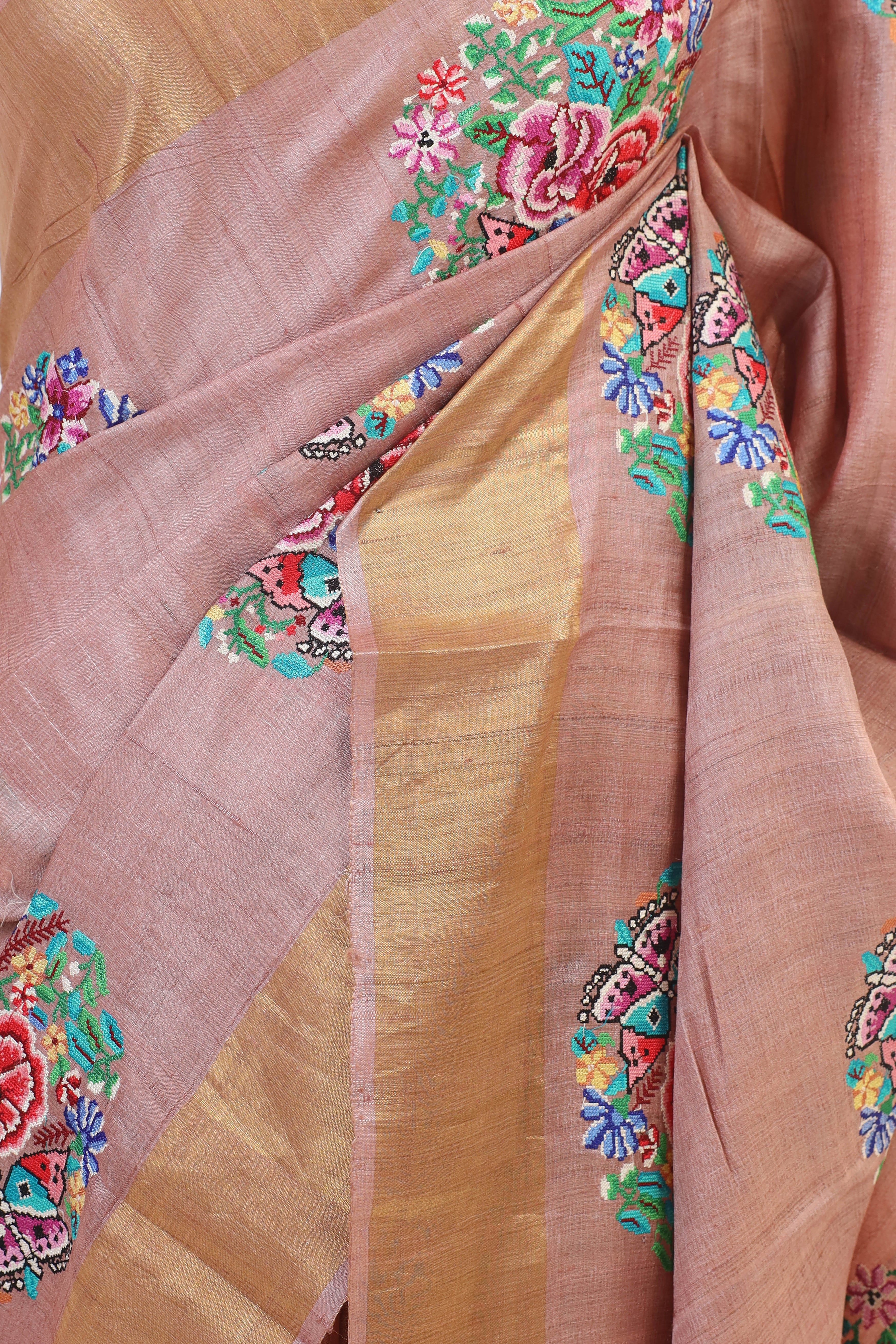 Peach Pink Tussar Silk Saree with Intricate Floral  Embroidery and Subtle Golden Border