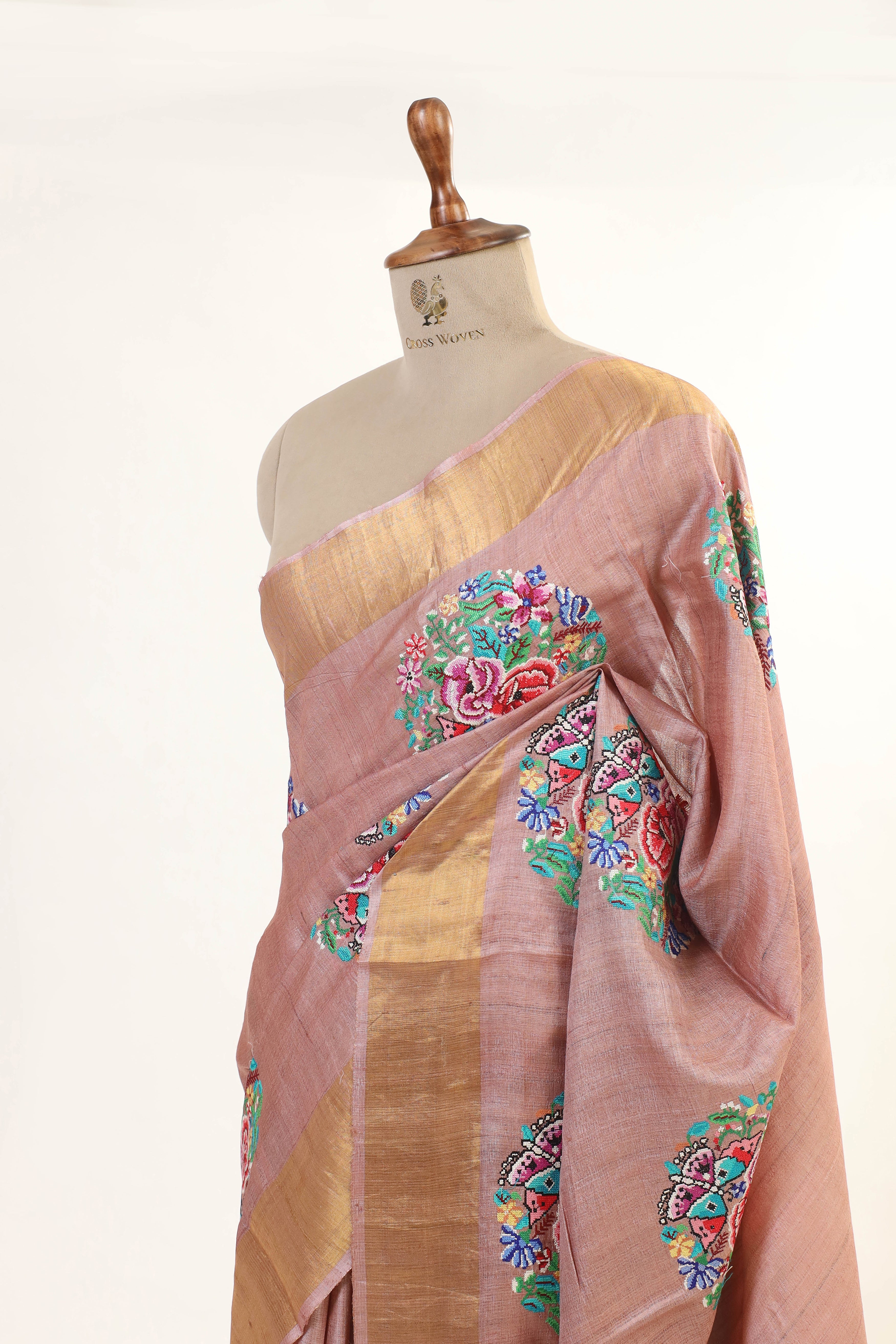 Peach Pink Tussar Silk Saree with Intricate Floral  Embroidery and Subtle Golden Border